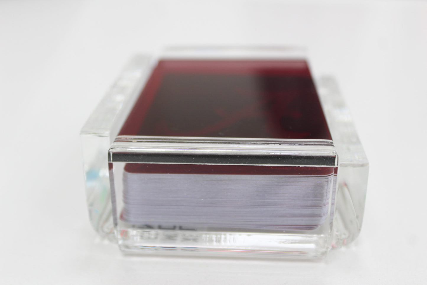 red acrylic playing card case from FOSTER