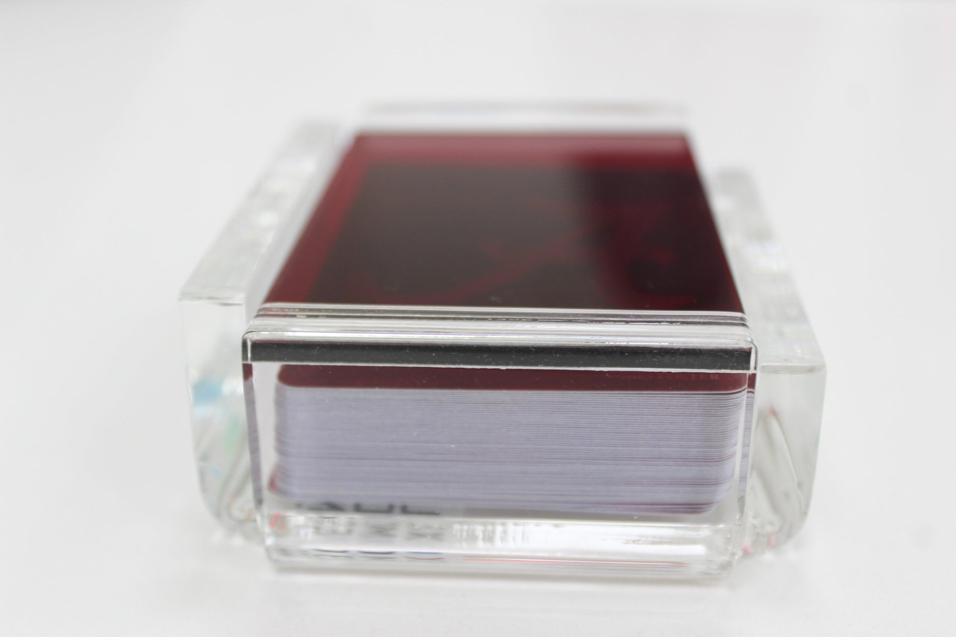 red acrylic playing card case from FOSTER